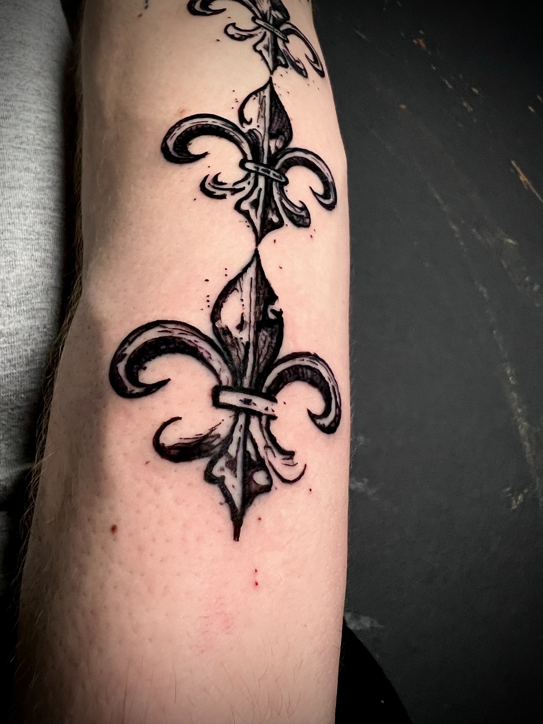 Fleur-de-Lis Blackwork Tattoo