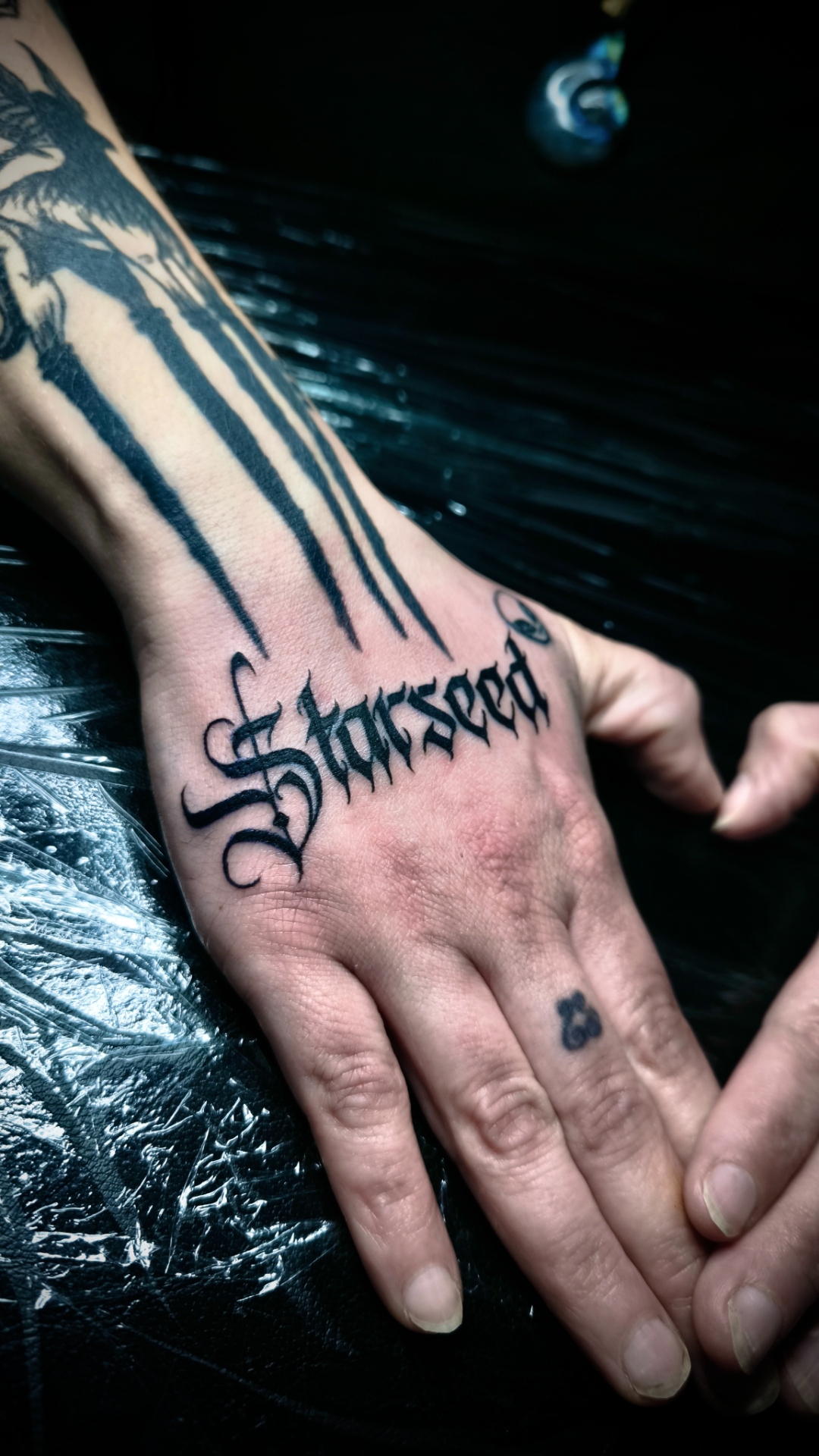 Blackwork Lettering Hand Tattoo